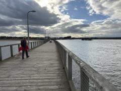 The path goes across South Jetty in Amble